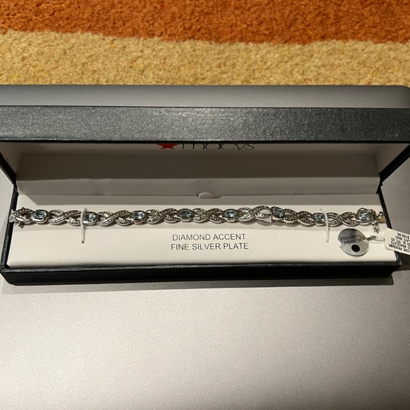 Silver Blue Topaz Infinity Bracelet - Picture 4 of 6